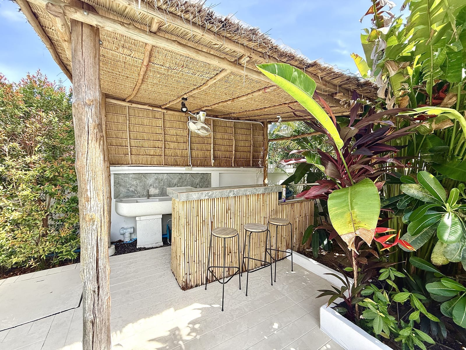 Bamboo pool bar and garden at Villa Bua