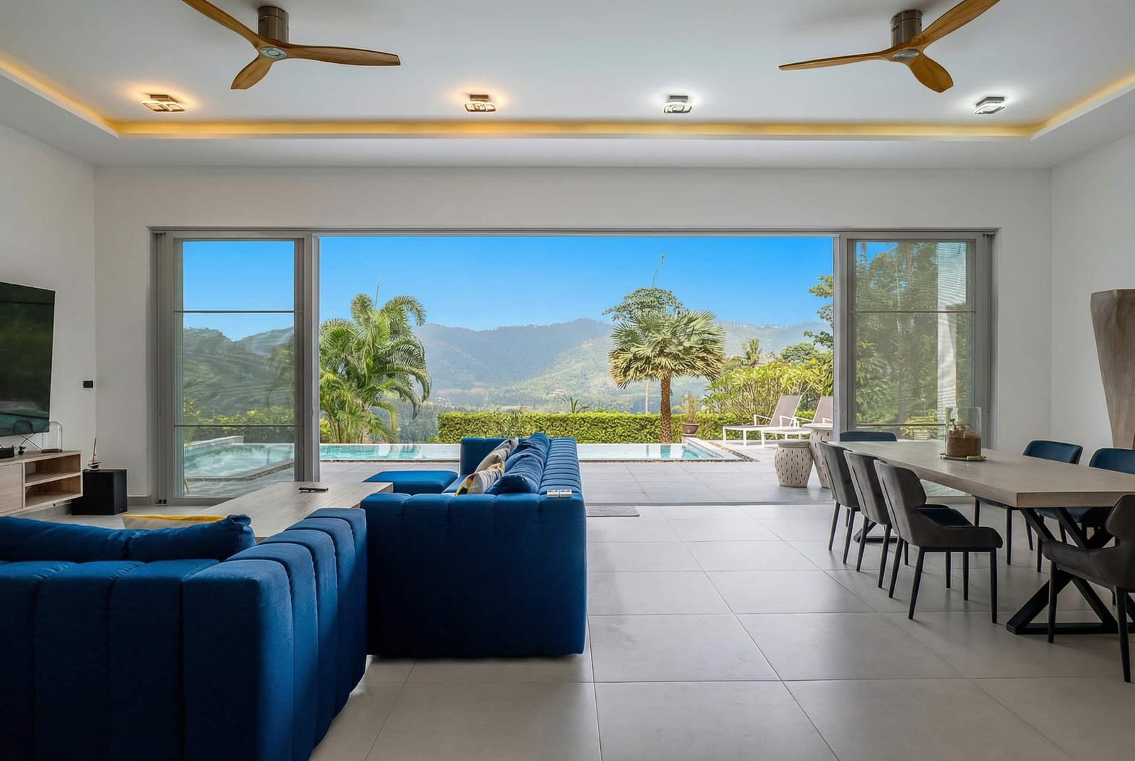 Living room opening onto the jungle view at Villa Passiflore