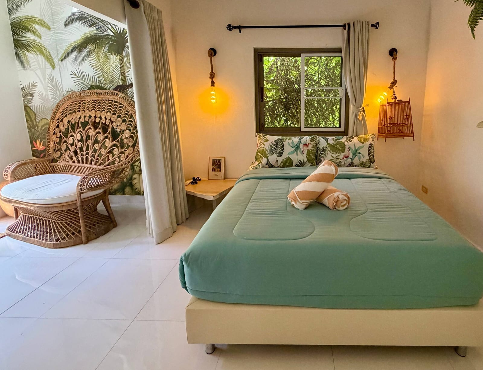 Bedroom opening onto the garden at Villa Samui Cao